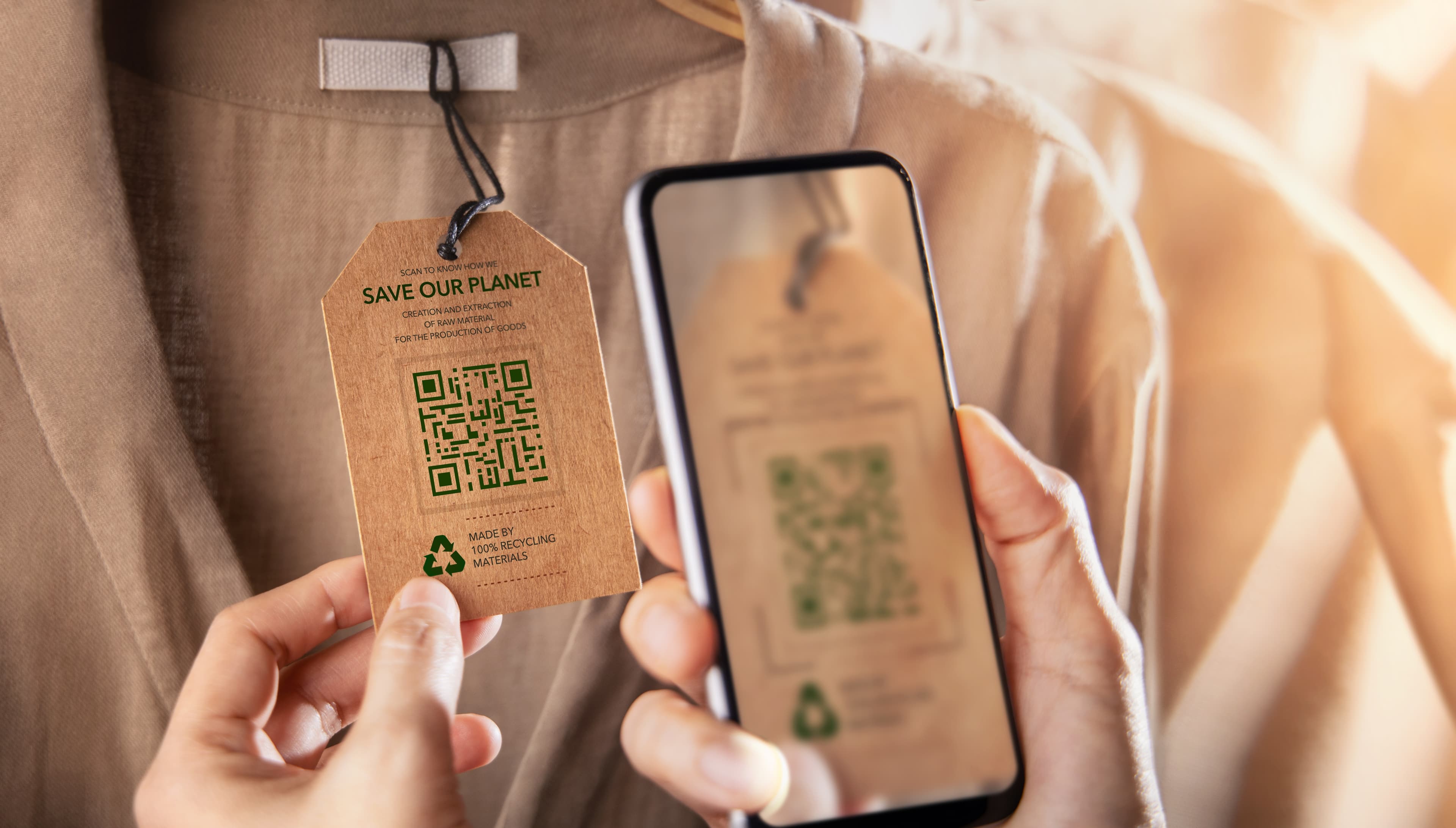 phone scanning QR code about recycling